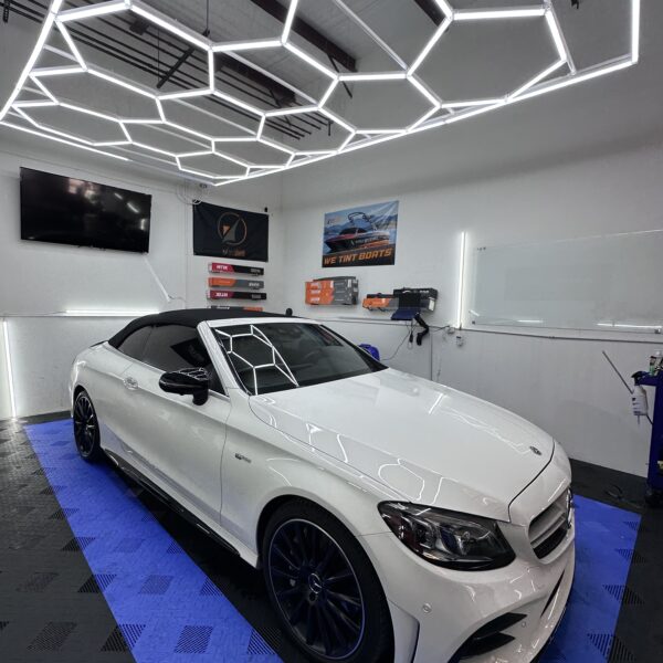 professional auto window tinting in Gainesville, GA on a white convertible car