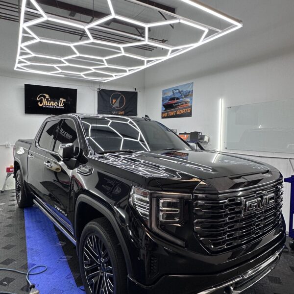 expert auto window tinting in Gainesville, GA on a black truck GMC