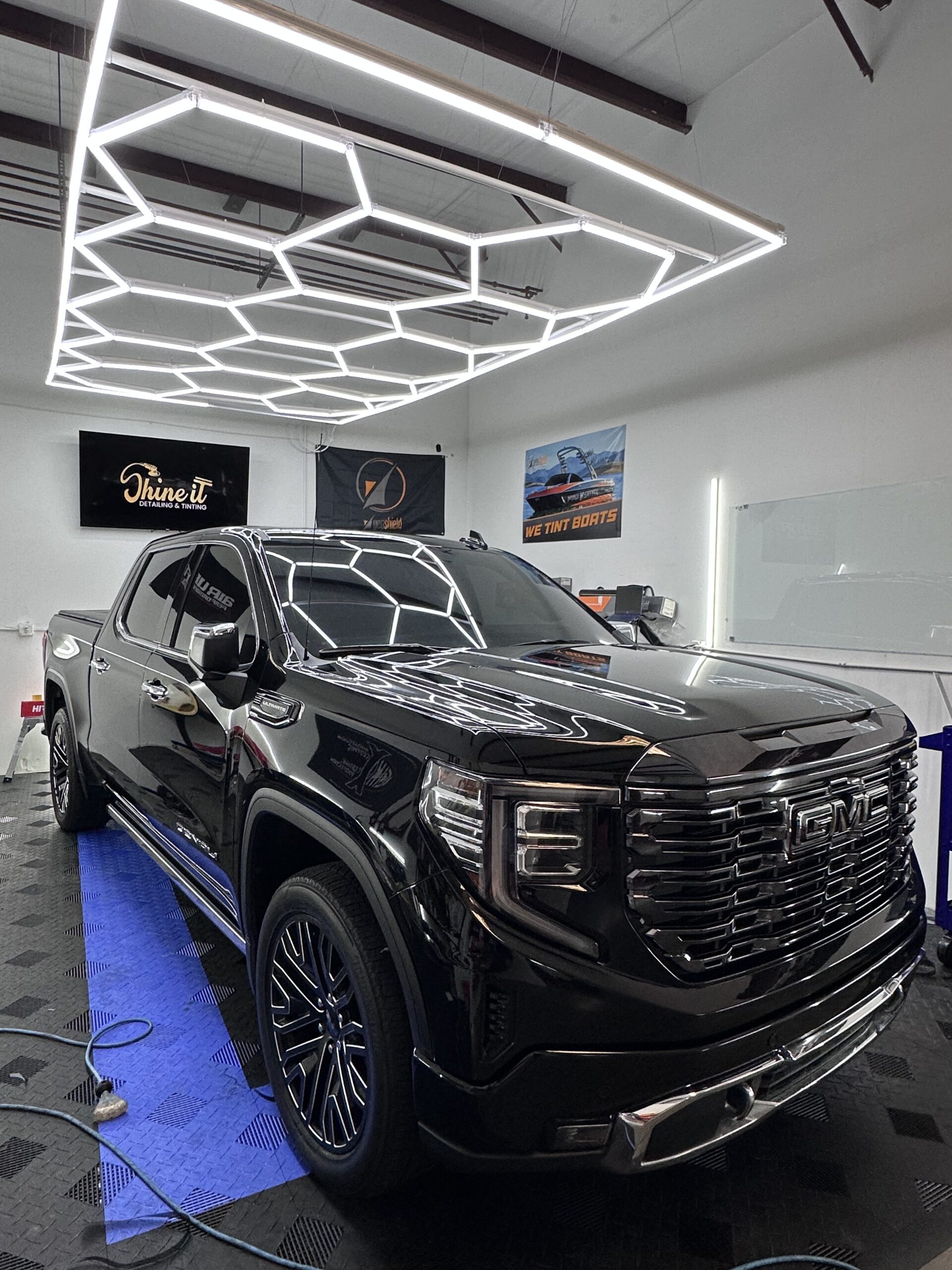expert auto window tinting in Gainesville, GA on a black truck GMC